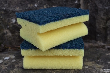 Yellow plastic kitchen sponges